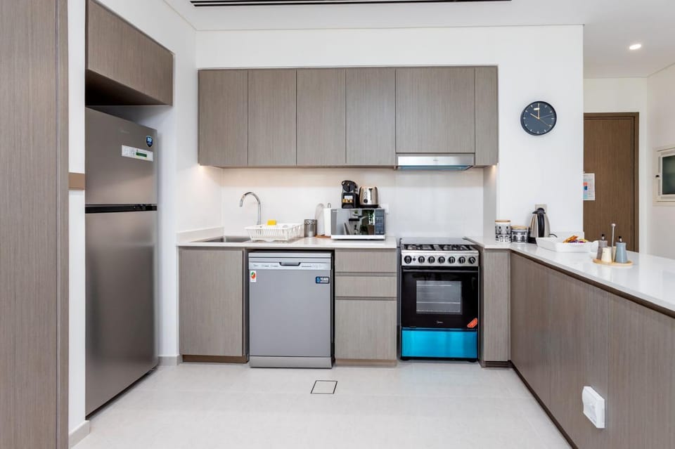 Kitchen or kitchenette, dishwasher, oven, stove, toaster