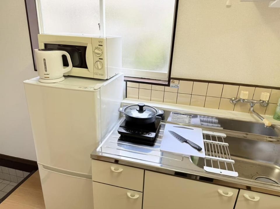Kitchen or kitchenette, stove