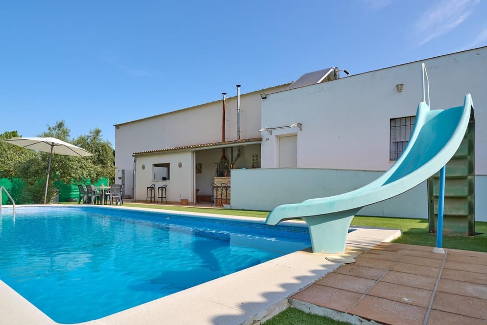 Property building, Living room, Swimming pool