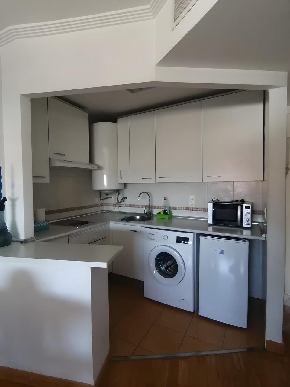 Kitchen or kitchenette, oven, toaster