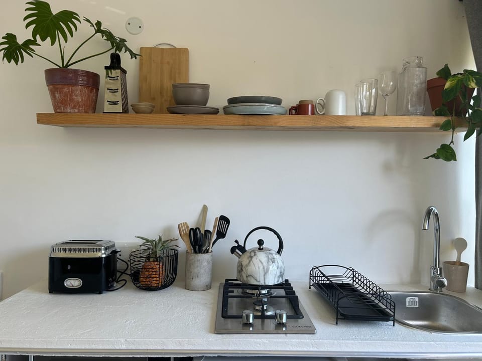 Kitchen or kitchenette, stove, toaster