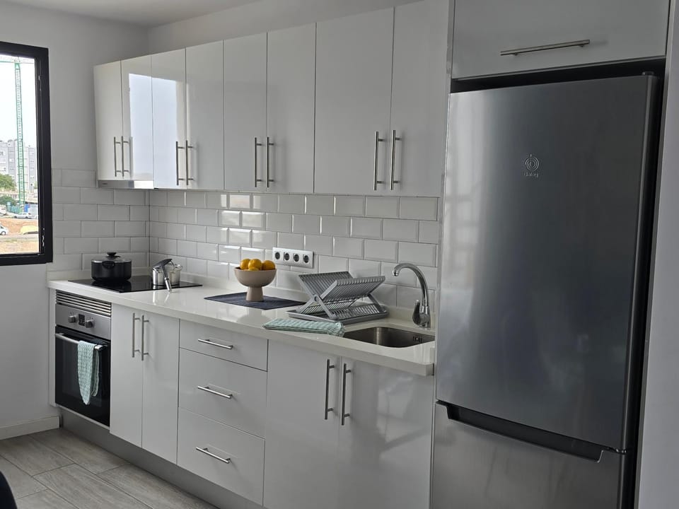 Kitchen or kitchenette, oven, stove