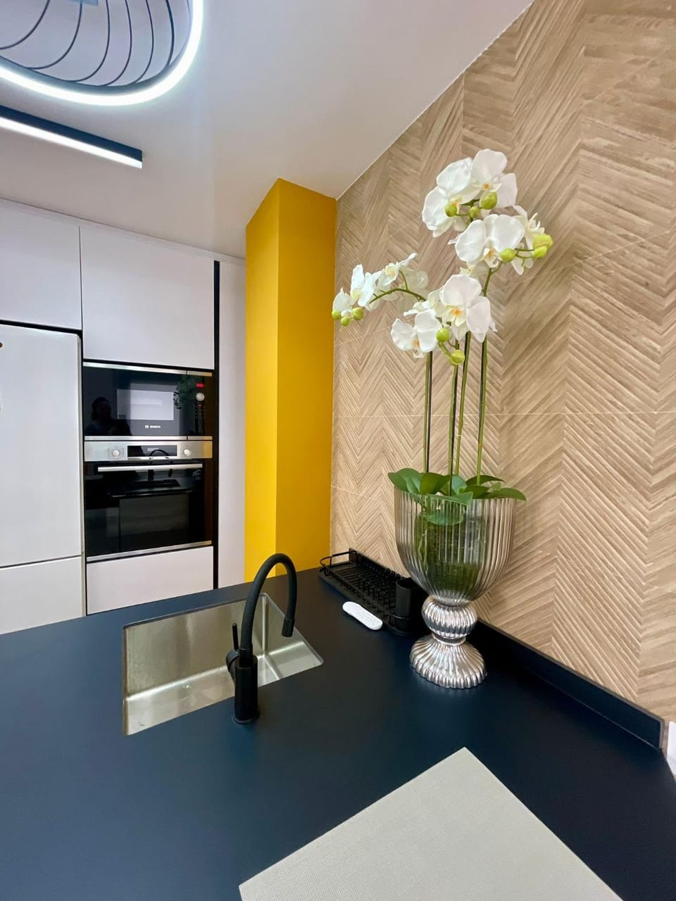 Kitchen or kitchenette, microwave, oven