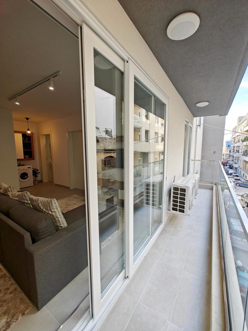 Property building, Day, View (from property/room), Balcony/Terrace, Living room, Seating area, washing machine