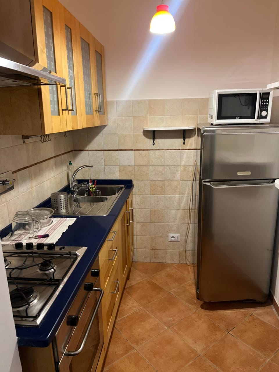 Kitchen or kitchenette, oven, stove
