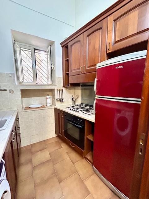 Kitchen or kitchenette, oven, stove