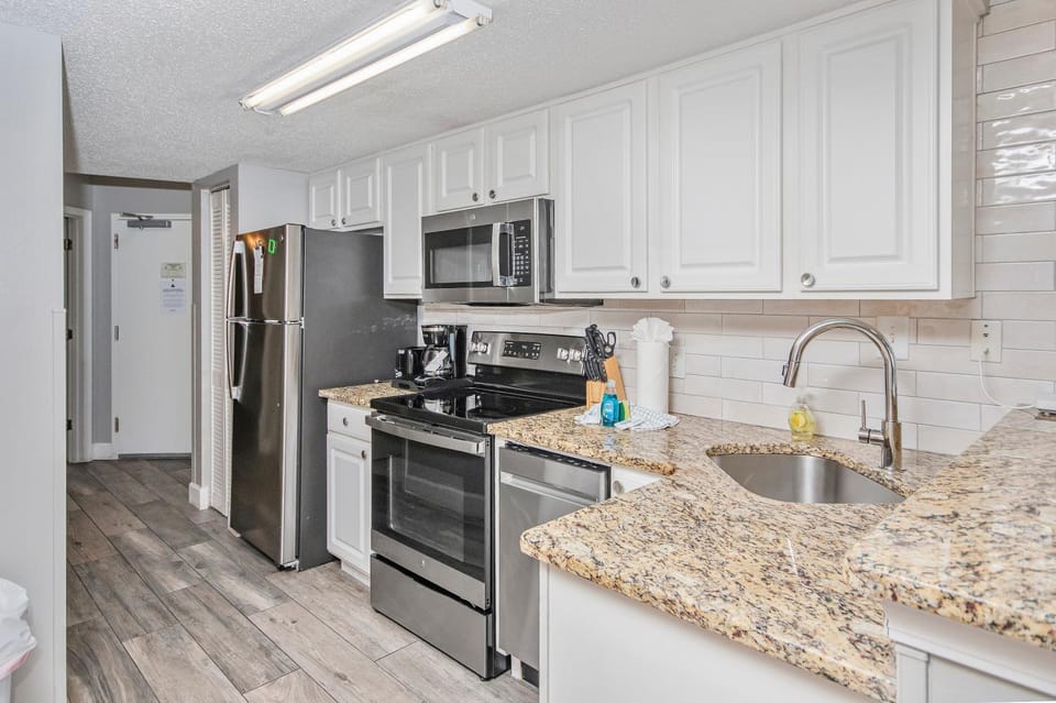 Kitchen or kitchenette, oven, toaster