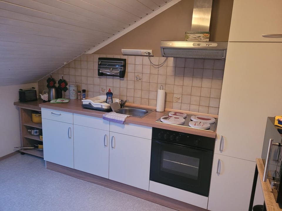 Kitchen or kitchenette, stove