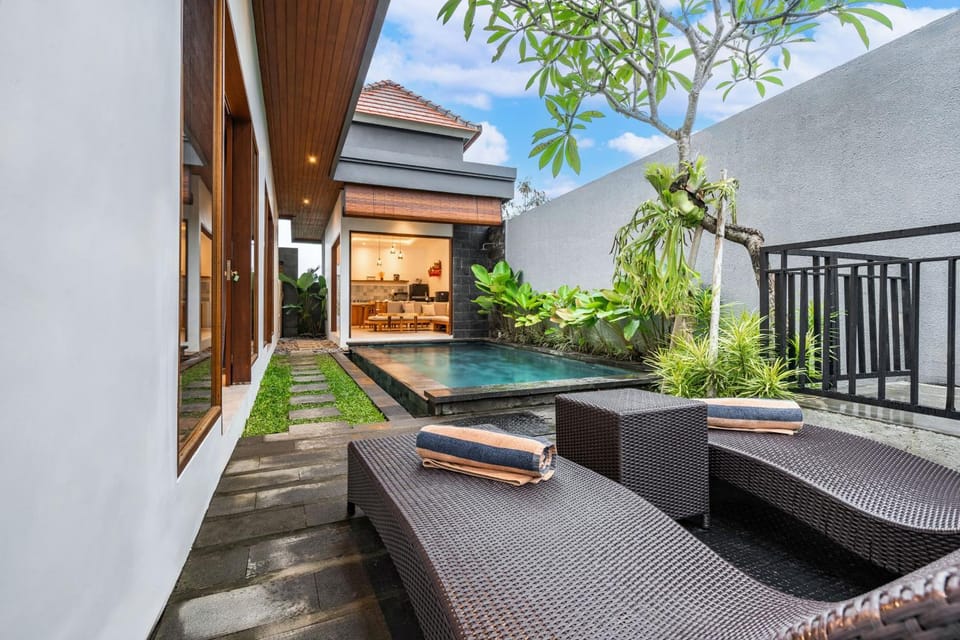 Property building, Patio, Day, View (from property/room), Balcony/Terrace, Living room, Seating area, Garden view, Pool view, Swimming pool