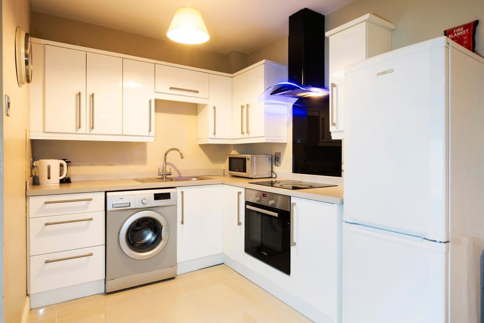 Kitchen or kitchenette, oven, stove