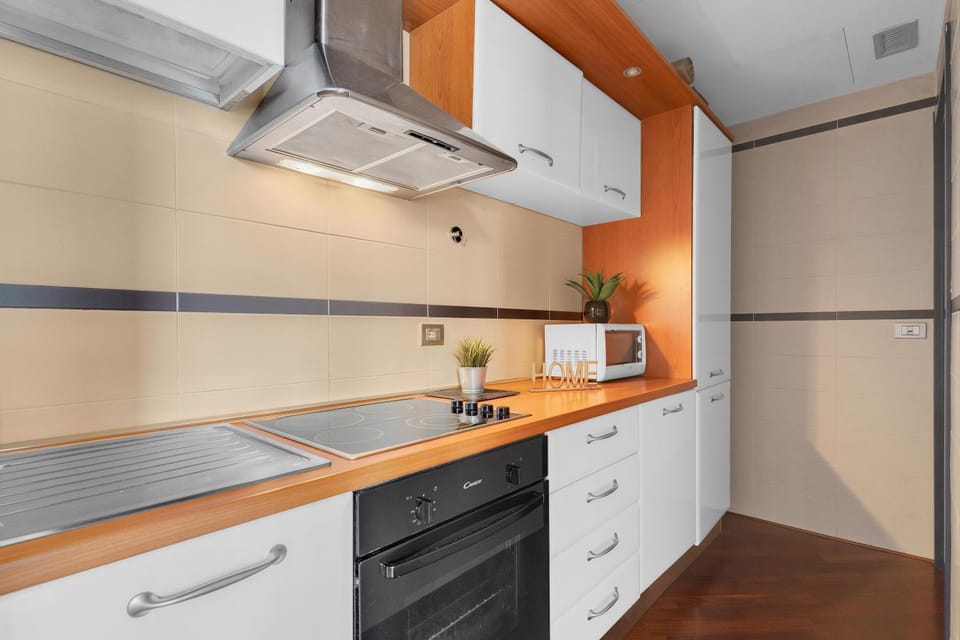 Kitchen or kitchenette, oven, stove
