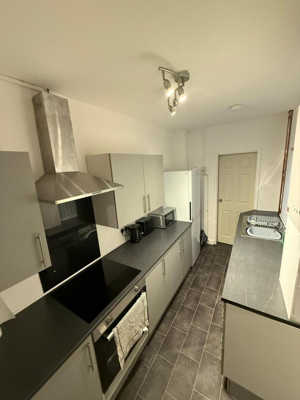 Kitchen or kitchenette, oven, stove
