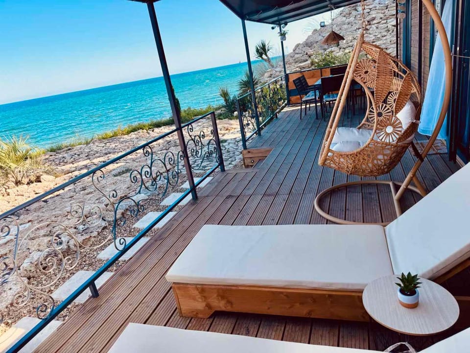 Natural landscape, View (from property/room), Balcony/Terrace, Seating area, Beach, Sea view, sunbed