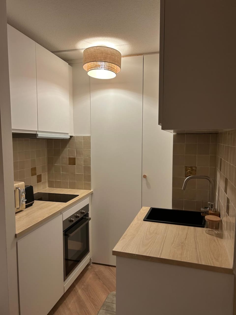 Kitchen or kitchenette, dishwasher, oven, stove