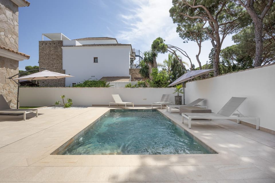 Property building, Living room, Swimming pool
