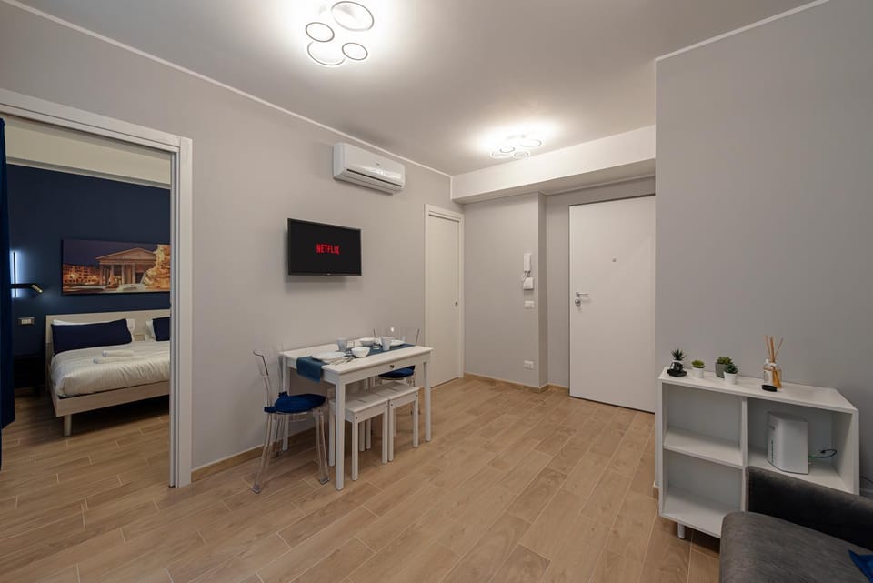Bed, TV and multimedia, Living room, Photo of the whole room, Seating area, Dining area, air conditioner