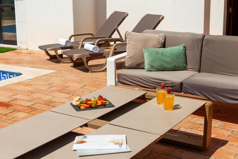 Patio, Seating area, Swimming pool, sunbed