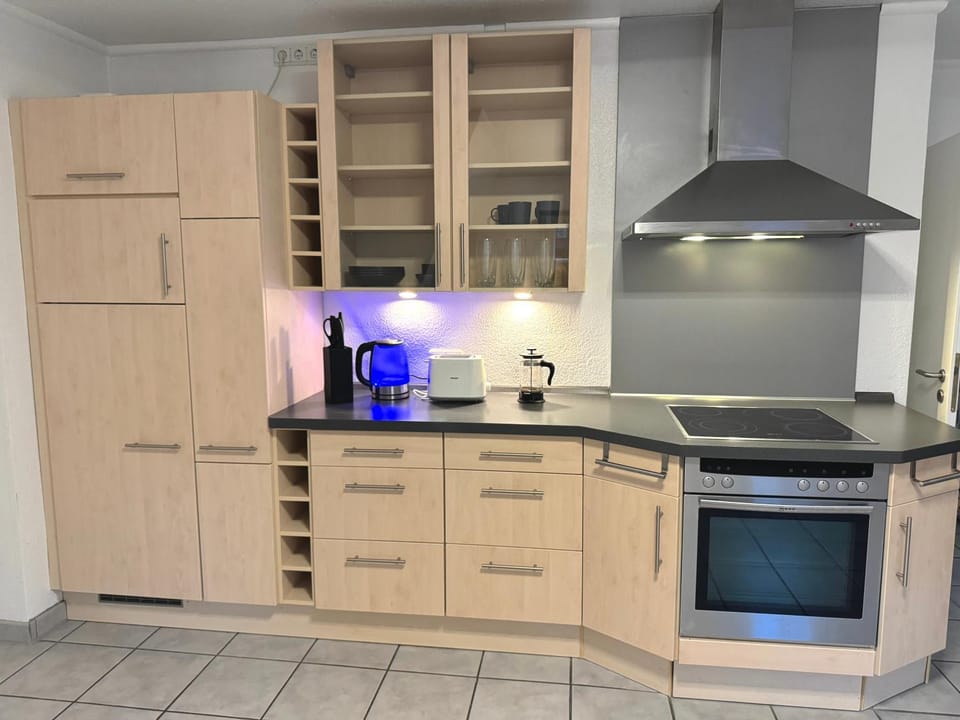 Kitchen or kitchenette, oven, stove