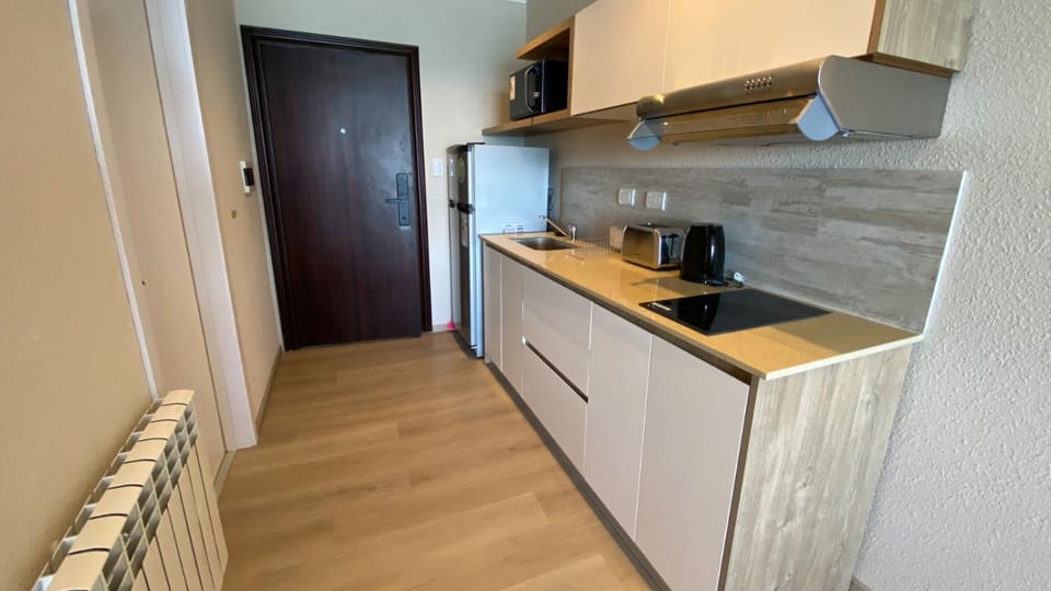 Kitchen or kitchenette, toaster