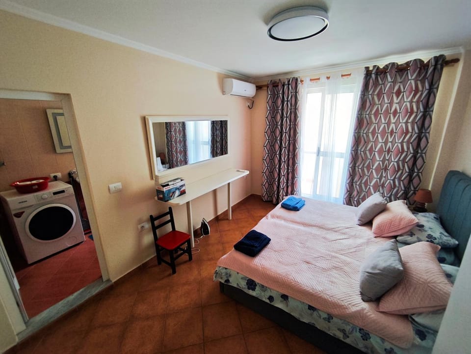 Photo of the whole room, Bedroom, towels, washing machine, air conditioner