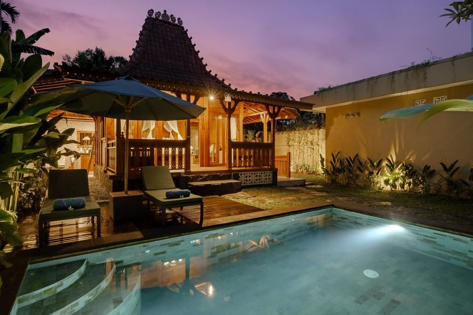 Property building, Patio, Night, Natural landscape, Pool view, Swimming pool, sunbed