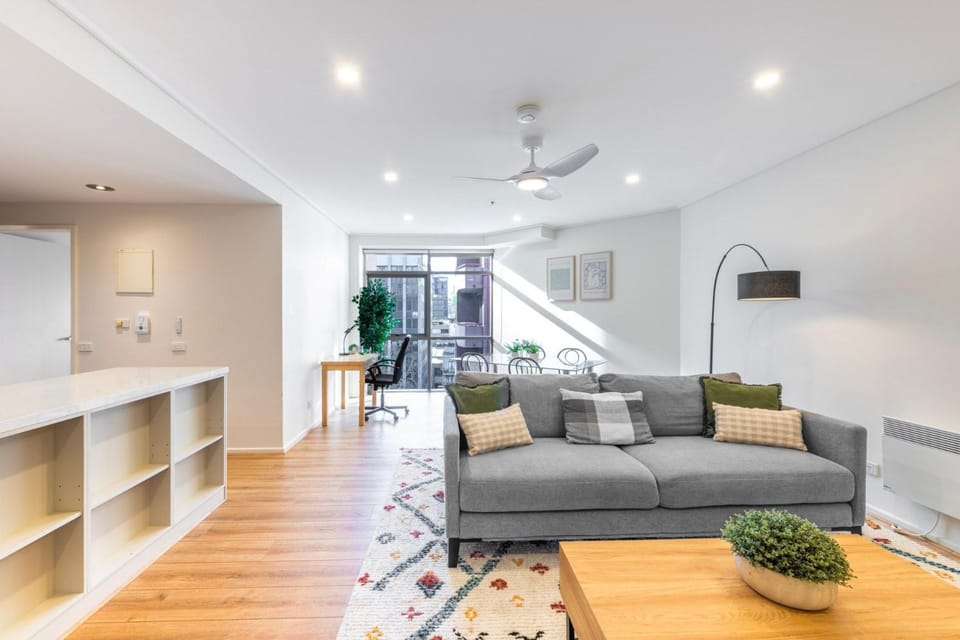 Tennis & Tranquility on Exhibition Apartment in Melbourne
