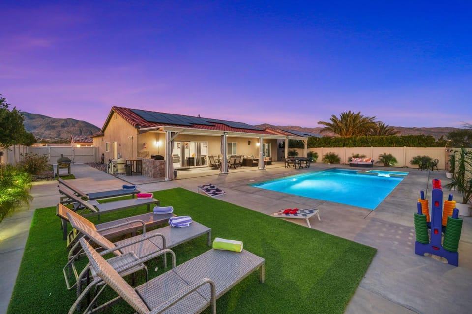 Property building, Patio, Pool view, Swimming pool, sunbed