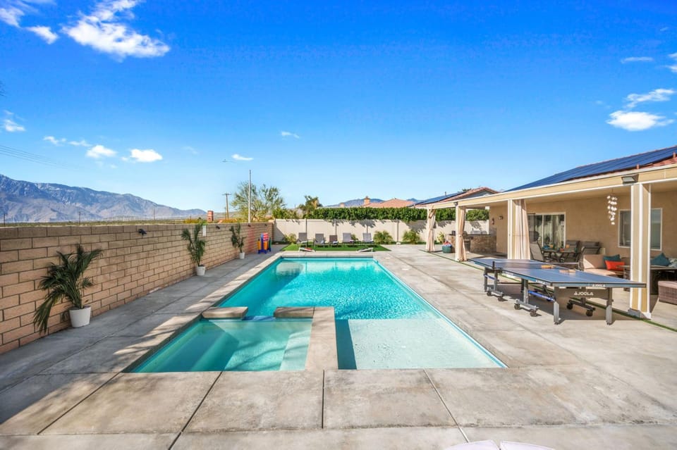 Property building, Patio, Mountain view, Swimming pool, sunbed