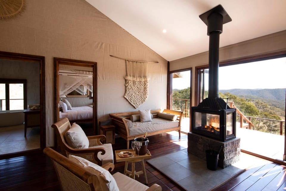 Natural landscape, Living room, Seating area, Mountain view, Drinks, fireplace