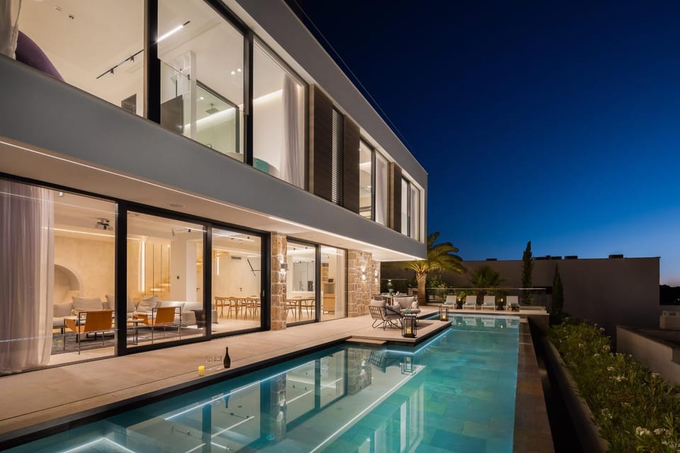 Property building, Patio, Night, Pool view, Swimming pool, sunbed