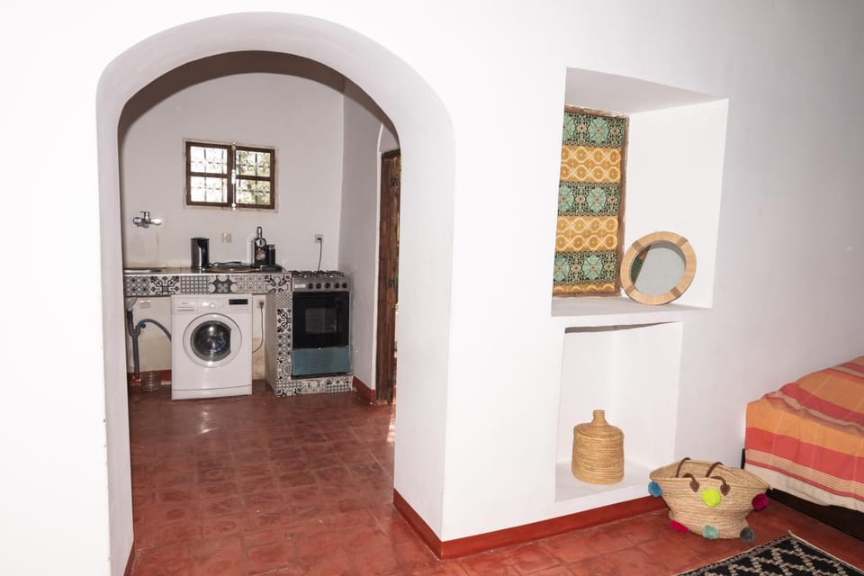 Kitchen or kitchenette, washing machine