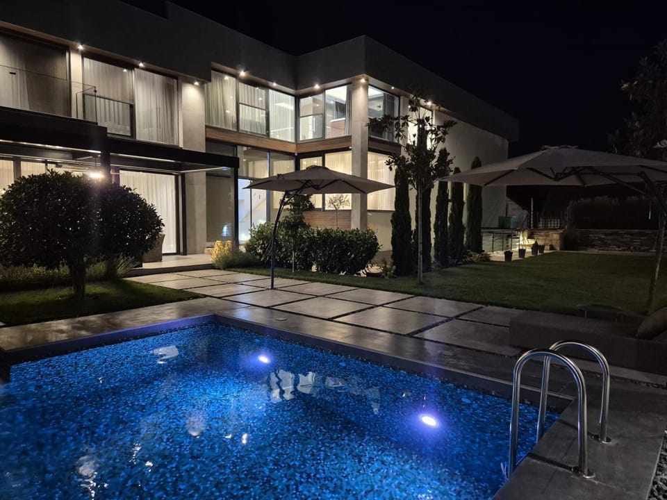Property building, Night, Swimming pool