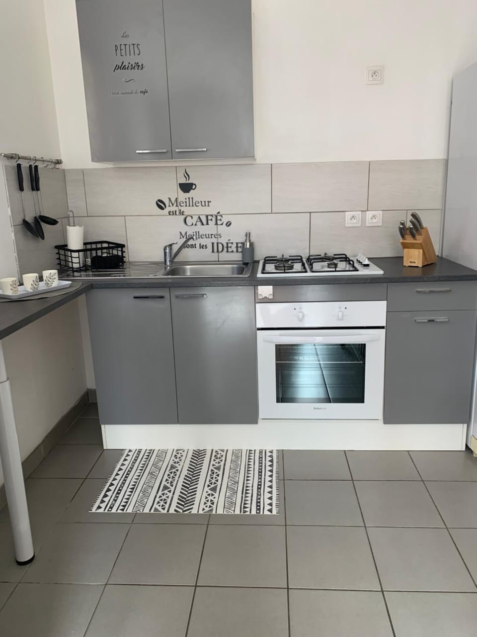 Kitchen or kitchenette, stove, toaster