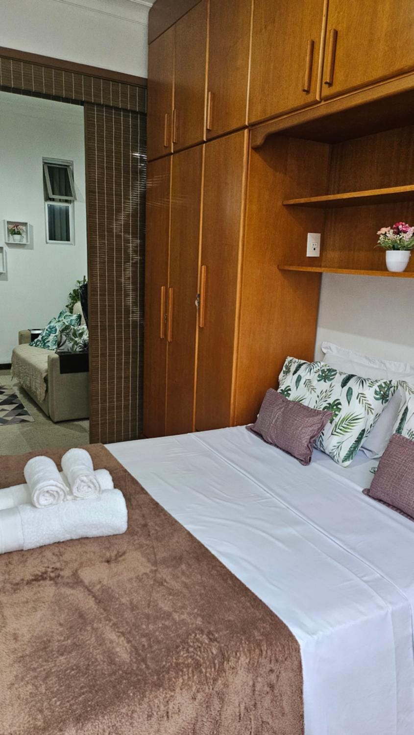 Bed, Living room, Photo of the whole room, Seating area, Bedroom, towels, wardrobe