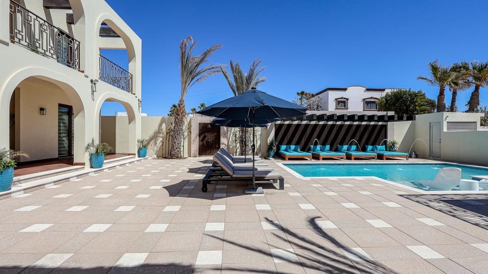 Property building, Patio, Pool view, Swimming pool, sunbed