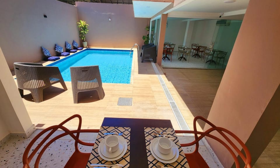Property building, Seating area, Dining area, Pool view, Swimming pool, Breakfast