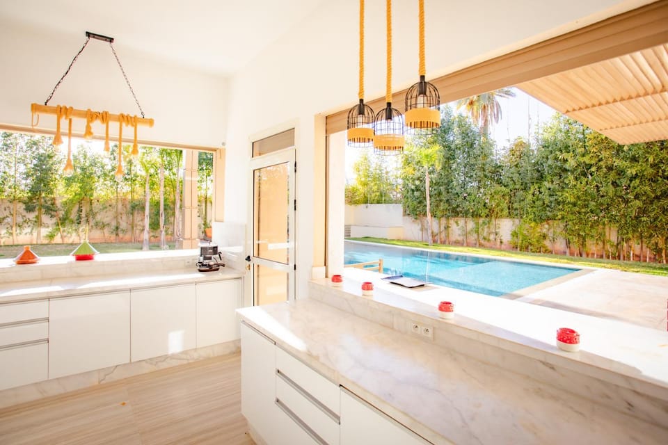 Kitchen or kitchenette, Lounge or bar, Communal kitchen, Garden view, Garden view, Pool view, Swimming pool