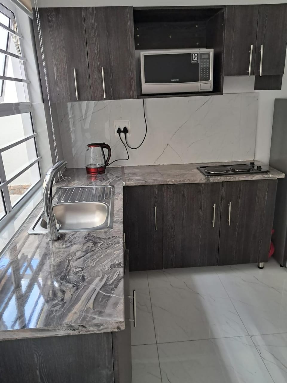 Kitchen or kitchenette, stove