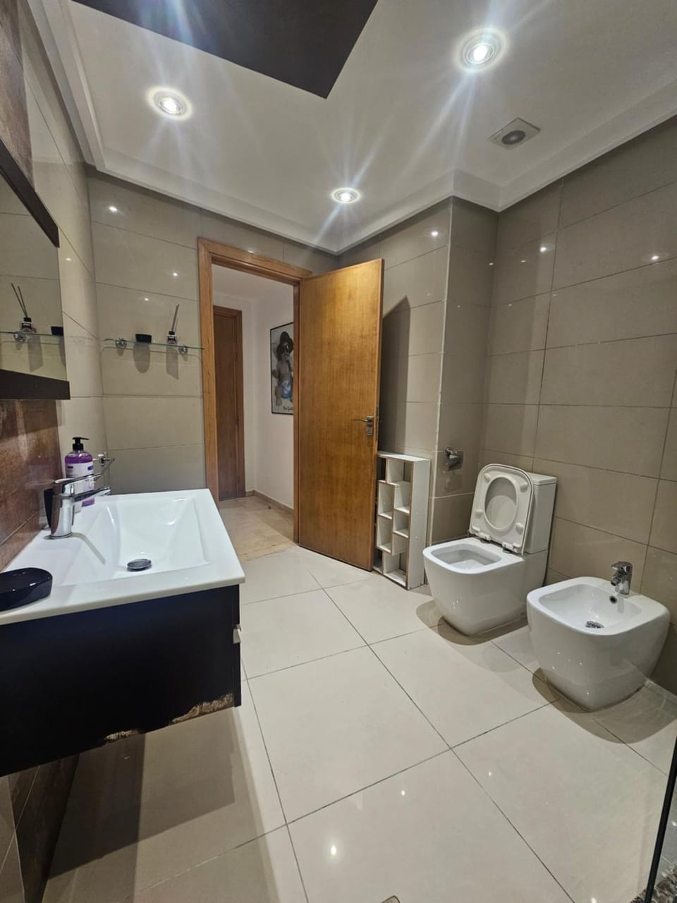 Shower, Toilet, Bathroom, bidet, hair dryier, towels