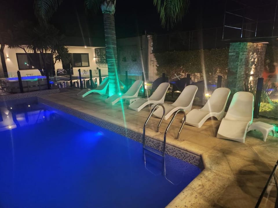 Night, Pool view, Swimming pool, sunbed