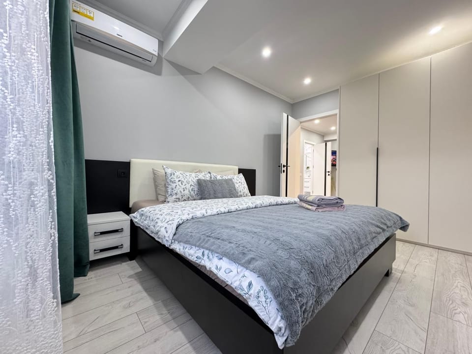 Bed, wardrobe, air conditioner