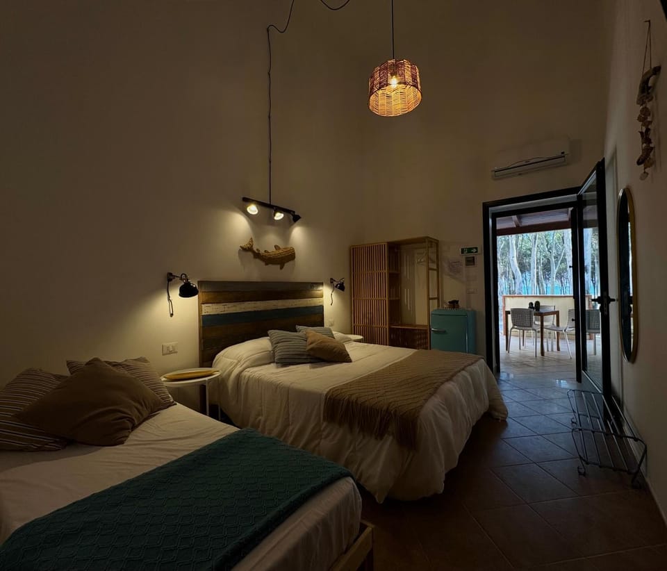 Property building, Bed, Bathroom, Balcony/Terrace, Photo of the whole room, Bedroom, Breakfast, hair dryier, towels, wardrobe, air conditioner