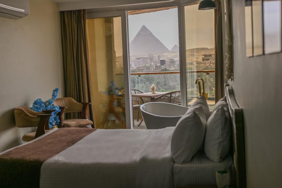 Bed, Natural landscape, View (from property/room), Balcony/Terrace, Living room, Photo of the whole room, Seating area, Bedroom, Mountain view, air conditioner