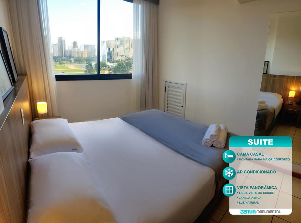 Bed, Photo of the whole room, Bedroom, Text overlay, towels