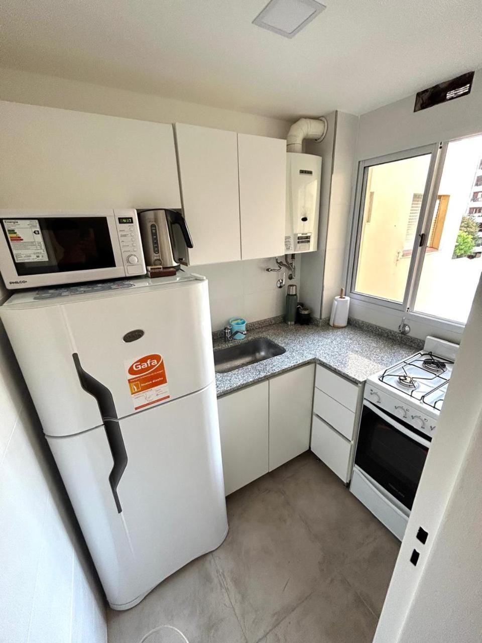 Kitchen or kitchenette, oven, toaster