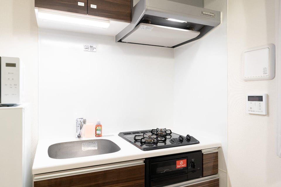 Kitchen or kitchenette, stove
