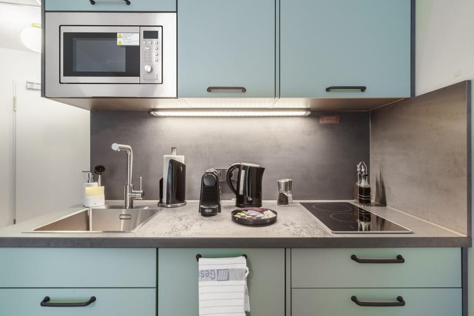 Kitchen or kitchenette, stove, toaster