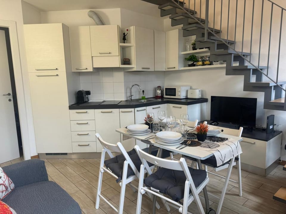 Kitchen or kitchenette, Living room, Dining area, oven, stove, toaster