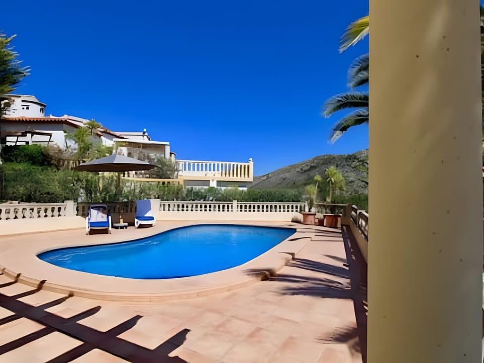 Property building, Living room, Swimming pool