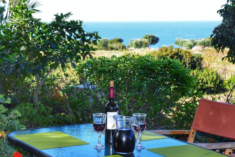 Natural landscape, Garden, Food and drinks, Dining area, Evening entertainment, Sea view